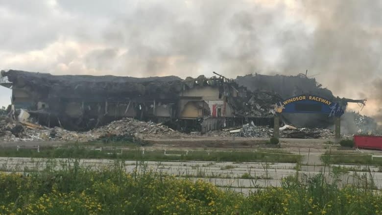 Windsor Raceway building continues to burn under supervision