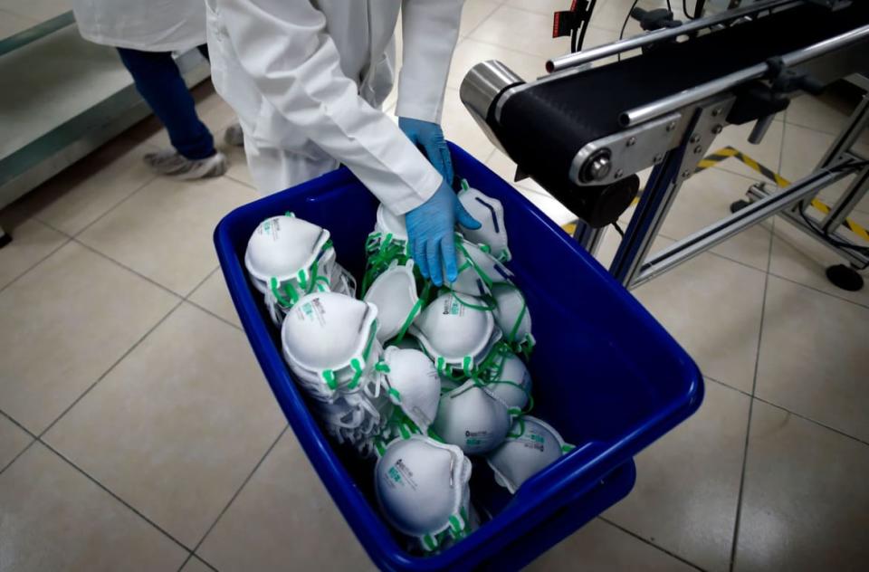 <div class="inline-image__caption"><p>N95 face masks being made in a factory.</p></div> <div class="inline-image__credit">Alfredo Estrella/AFP via Getty images</div>