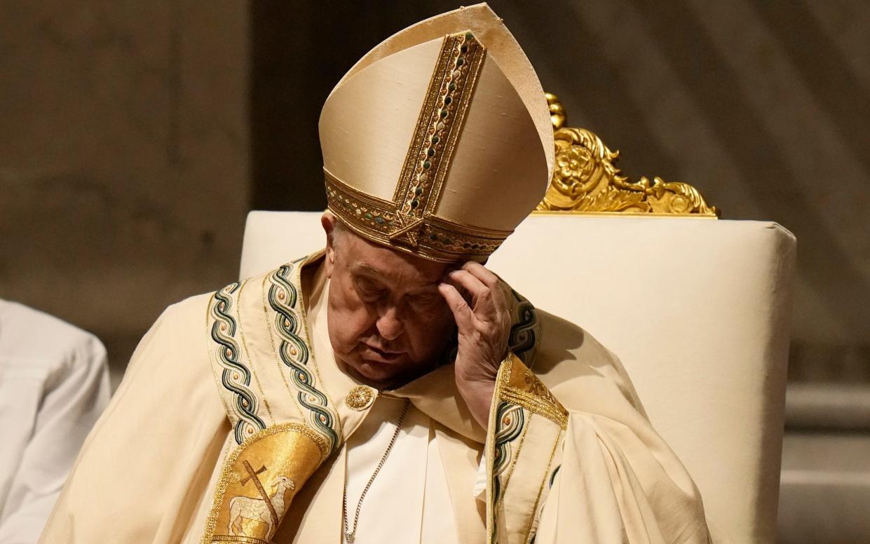 Pope Francis presides over the Easter vigil celebration in St Peter's Basilica