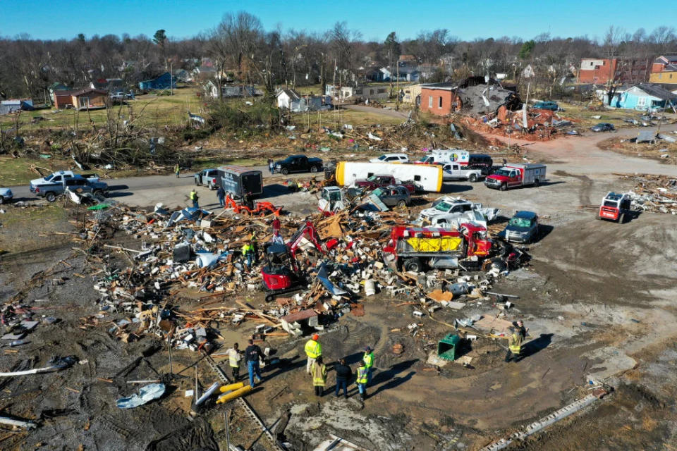 File: An aerial photo shows a damage as cleanup efforts after a tornado hit Mayfield, Kentucky, United States on December 12, 2021.