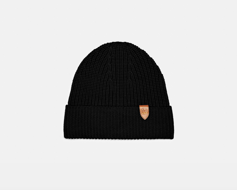 Knit Beanie in black (Photo via Coach Outlet)