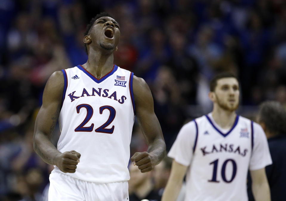 FILE - In this March 10, 2018, file photo, Kansas' Silvio De Sousa (22) celebrates during the second half of the NCAA college basketball championship game against West Virginia in the Big 12 men's tournament, in Kansas City, Mo. Kansas is ranked No. 1 in The Associated Press preseason Top 25 poll released Monday, Oct. 22, 2018. (AP Photo/Charlie Riedel, File)