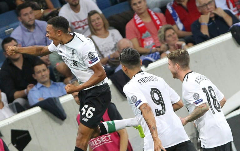 Liverpool's Trent Alexander-Arnold (left) celebrates after scoring the only goal in the Champions League qualifier match against Hoffenheim in Sinsheim, Germany