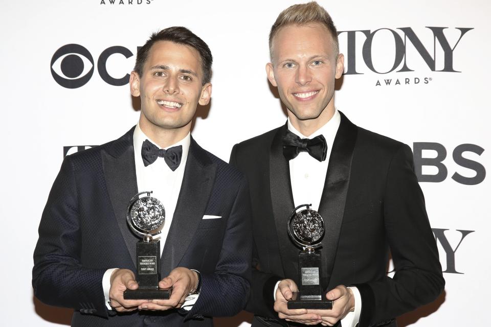 Benj Pasek and Justin Paul pose at the 71st Annual Tony Awards, in the press room at Radio City Music Hall on June 11, 2017 in New York City