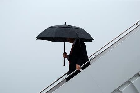 U.S. President Donald Trump arrives aboard Air Force One at Joint Base Andrews, Maryland, U.S. July 28, 2017. REUTERS/Jonathan Ernst/Files