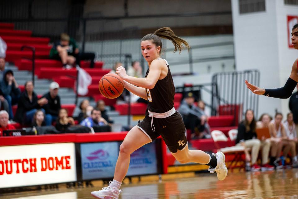 East's Rachel Miller takes the ball up the court against Holland Monday, Feb. 28, 2022, at Holland High School. 