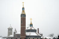 Buildings are blanketed in snow at the Archdiocese of Denver campus on Wednesday, Jan. 18, 2023. The archdiocese is being sued by a man who alleges about 100 instances of abuse at St. Elizabeth Ann Seton Church in Fort Collins, Colo., from 1998 to 2003. The lawsuit is allowed under a 2021 state law that opened up a three-year window for people to pursue litigation for sexual abuse that happened to them as children dating as far back as 1960. (AP Photo/Thomas Peipert)