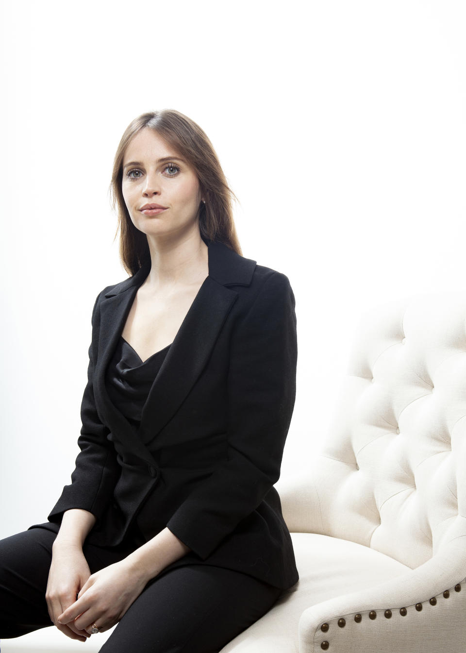 In this dec. 8, 2018 photo, actress Felicity Jones poses for a portrait on Dec 8, 2018 at the Four Seasons Hotel in Los Angeles to promote her film "On the Basis of Sex". (Photo by Rebecca Cabage/Invision/AP)