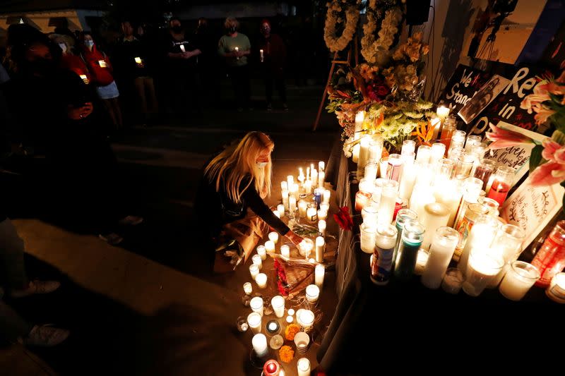 People attend a vigil for cinematographer Halyna Hutchins, who was fatally shot on the film set of "Rust", in Burbank