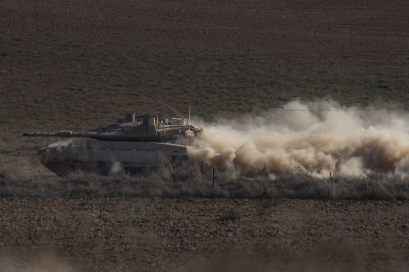 Hamas-run Ministry of Health said that Israeli tanks had begun to surround Indonesian Hospital in the Gaza Strip. An Israeli seen here tank kicks up dust as it moves inside southern Israel near the border with the Gaza Strip on October 31, 2023. Photo by Jim Hollander/UPI
