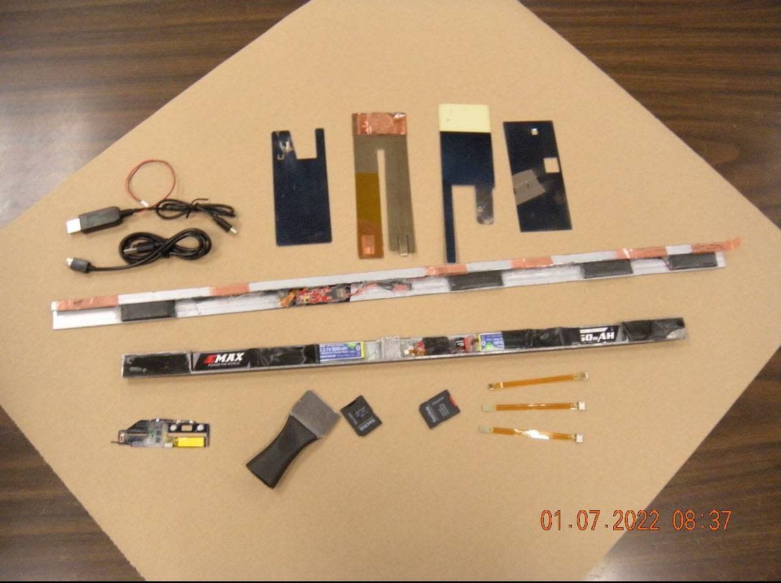 Parlier Police released this photo of devices used in skimming, in which thieves place fraudulent devices over ATMs or payment machines at stores and gas stations. Police arrested a man Friday for allegedly trying to install such a device at a bank ATM.