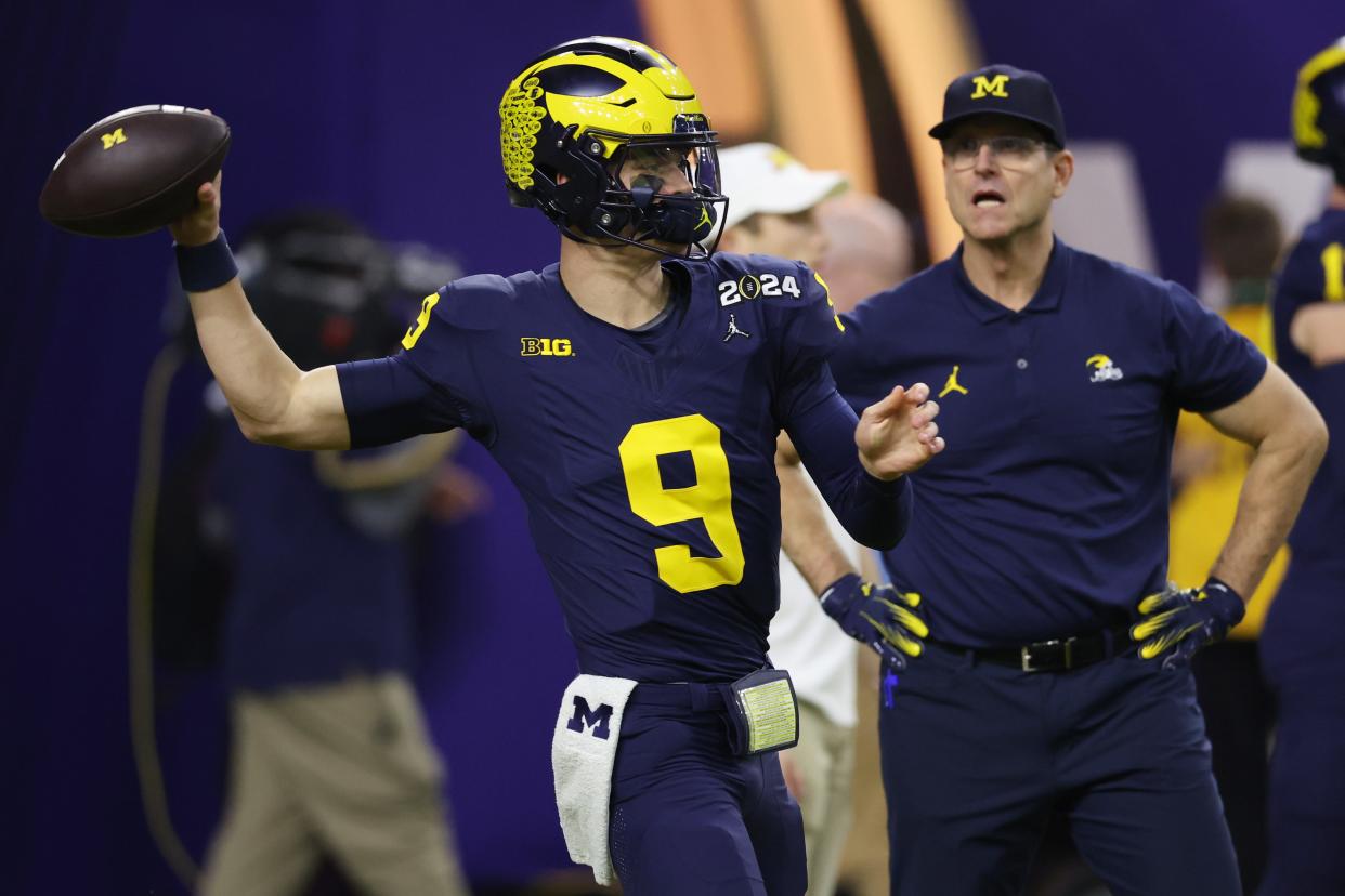 HOUSTON, TEXAS - JANUARY 08: J.J. McCarthy #9 of the Michigan Wolverines warms-up prior to the 2024 CFP National Championship game against the Washington Huskies at NRG Stadium on January 08, 2024 in Houston, Texas. (Photo by Gregory Shamus/Getty Images)