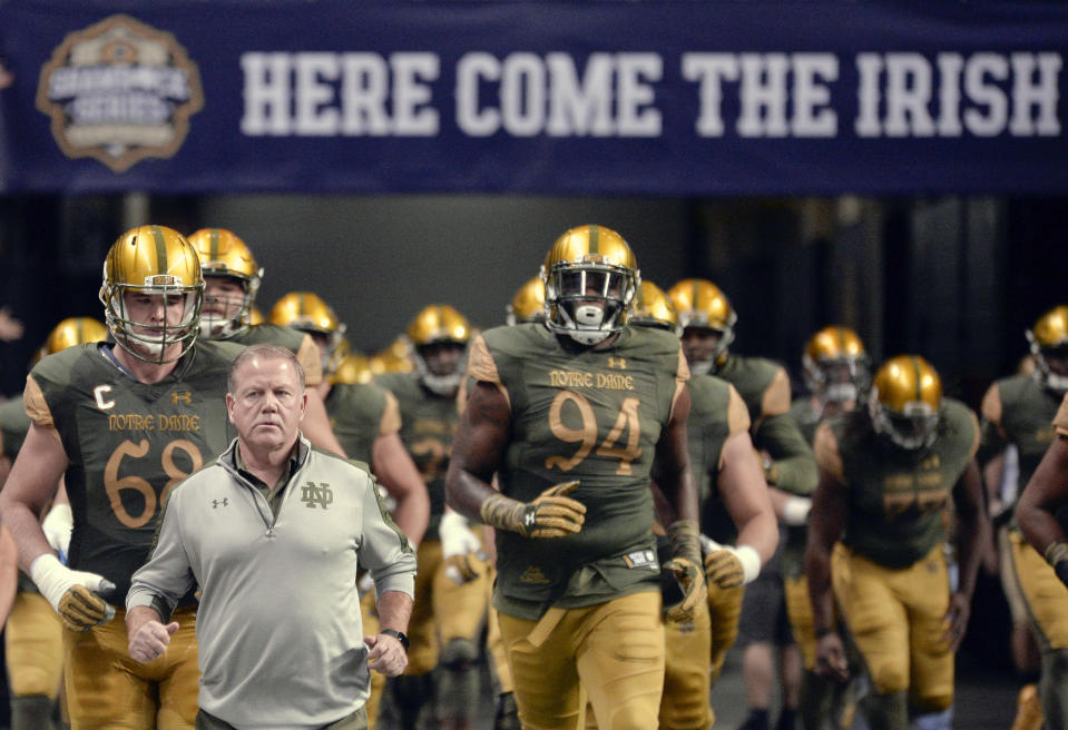Brian Kelly is 59-31 in seven seasons at Notre Dame. (AP)