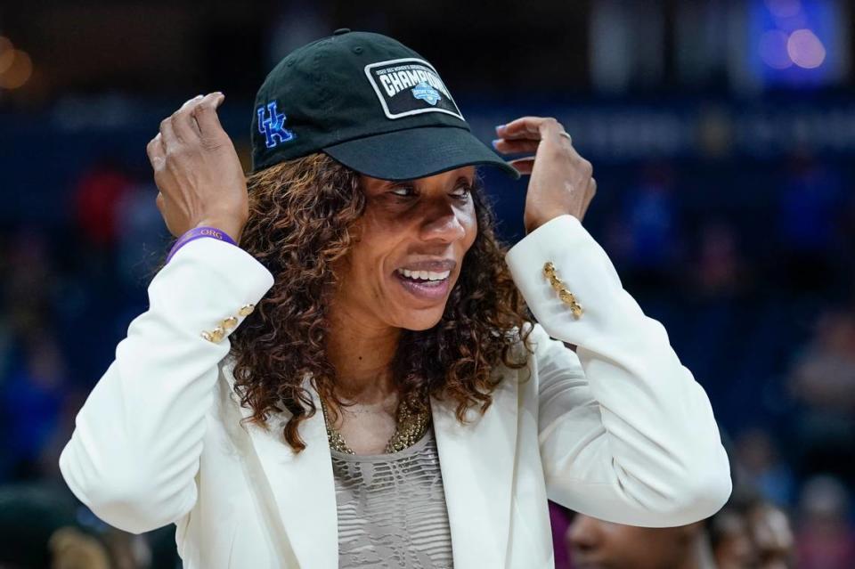 Kentucky Coach Kyra Elzy put on a championship cap after UK upset No. 1 South Carolina 64-62 to win the 2022 Southeastern Conference Women’s Basketball Tournament.