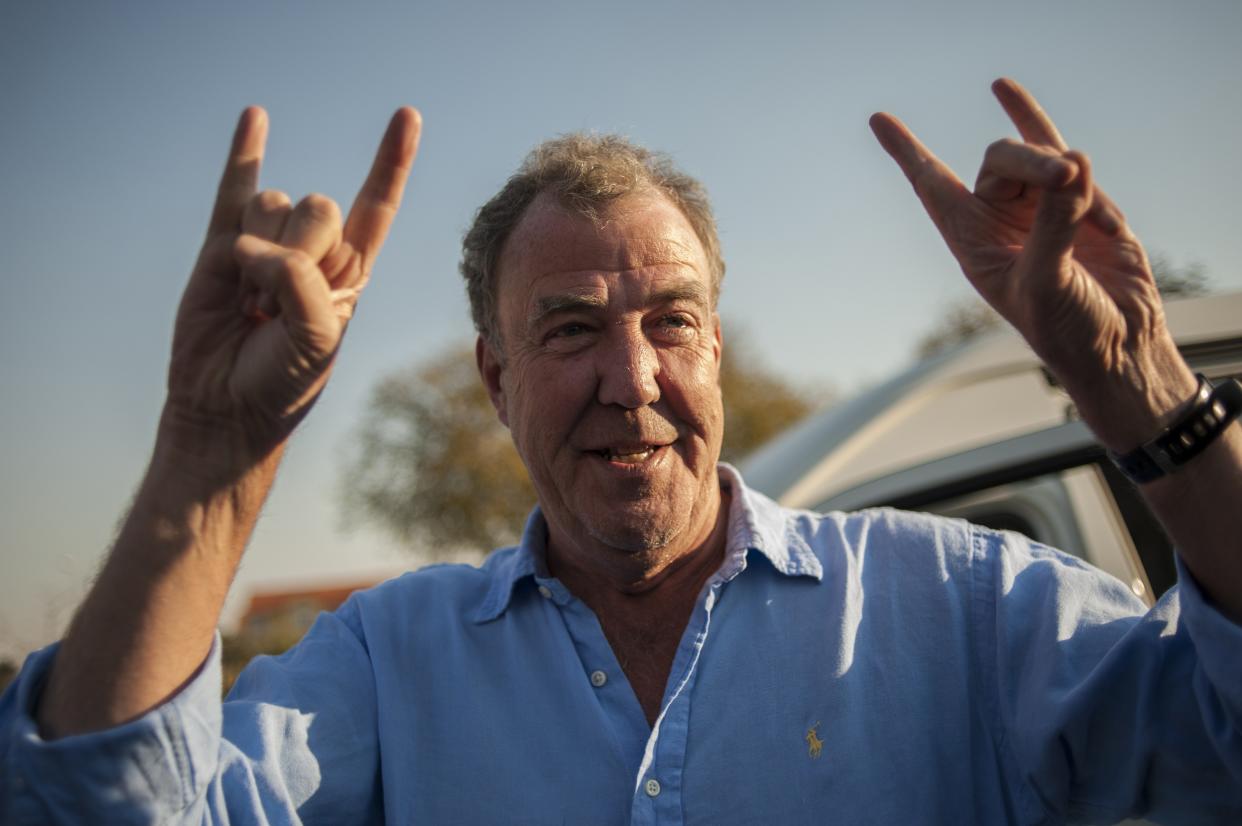 Former Top Gear presenter Jeremy Clarkson gestures as he arrives at the Ticketpro Dome for the Clarkson, Hammond and May Live Show held in Johannesburg on June 10, 2015. AFP PHOTO / STEFAN HEUNIS        (Photo credit should read STEFAN HEUNIS/AFP via Getty Images)