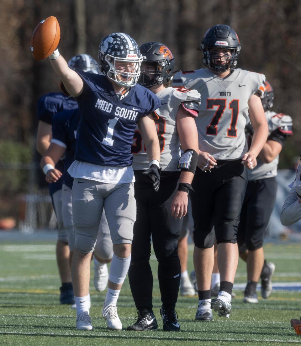 South Logan Colleran signals first down after catching short pass up middle. Middletown South defeats Middletown North in Thanksgiving Day game on November 24, 2022 in Middletown NJ. 