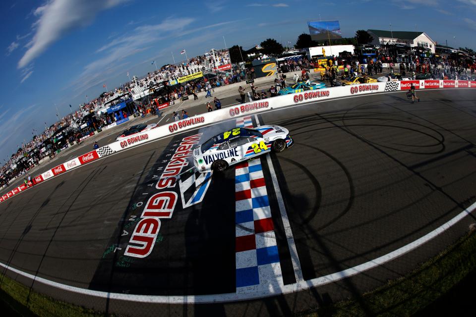 WATKINS GLEN, NEW YORK - AUGUST 20: William Byron, driver of the #24 Valvoline Chevrolet, celebrates with a burnout after winning the NASCAR Cup Series Go Bowling at The Glen at Watkins Glen International on August 20, 2023 in Watkins Glen, New York. (Photo by Sean Gardner/Getty Images)