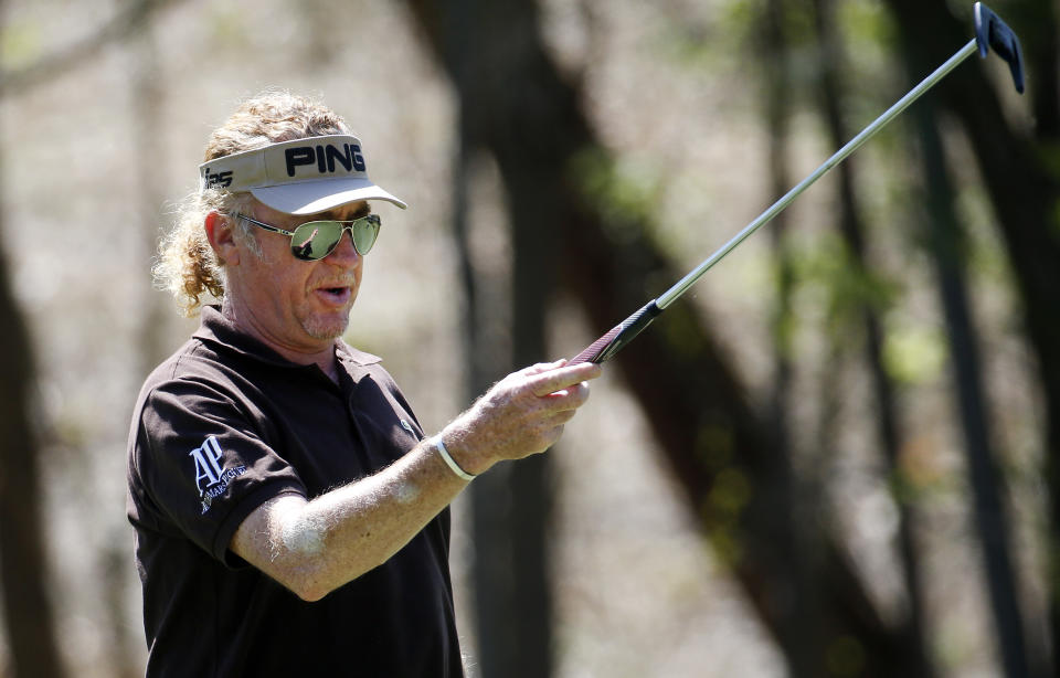 Miguel A. Jimenez reacts after missing a putt for an eagle on the 10th hole during the final round of play in the Greater Gwinnett Championship golf tournament of the Champions Tour, Sunday, April 20, 2014 in Duluth, Ga. (AP Photo/John Bazemore)