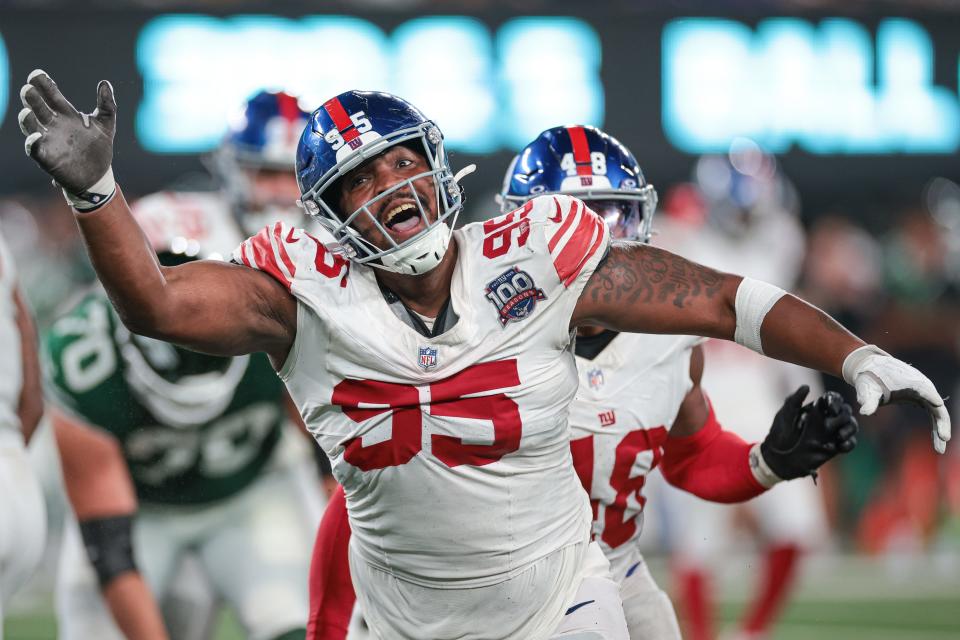 Aug 24, 2024; East Rutherford, New Jersey, USA; New York Giants defensive tackle Jordon Riley (95) reacts after a defensive stop during the second half against the New York Jets at MetLife Stadium. Mandatory Credit: Vincent Carchietta-USA TODAY Sports