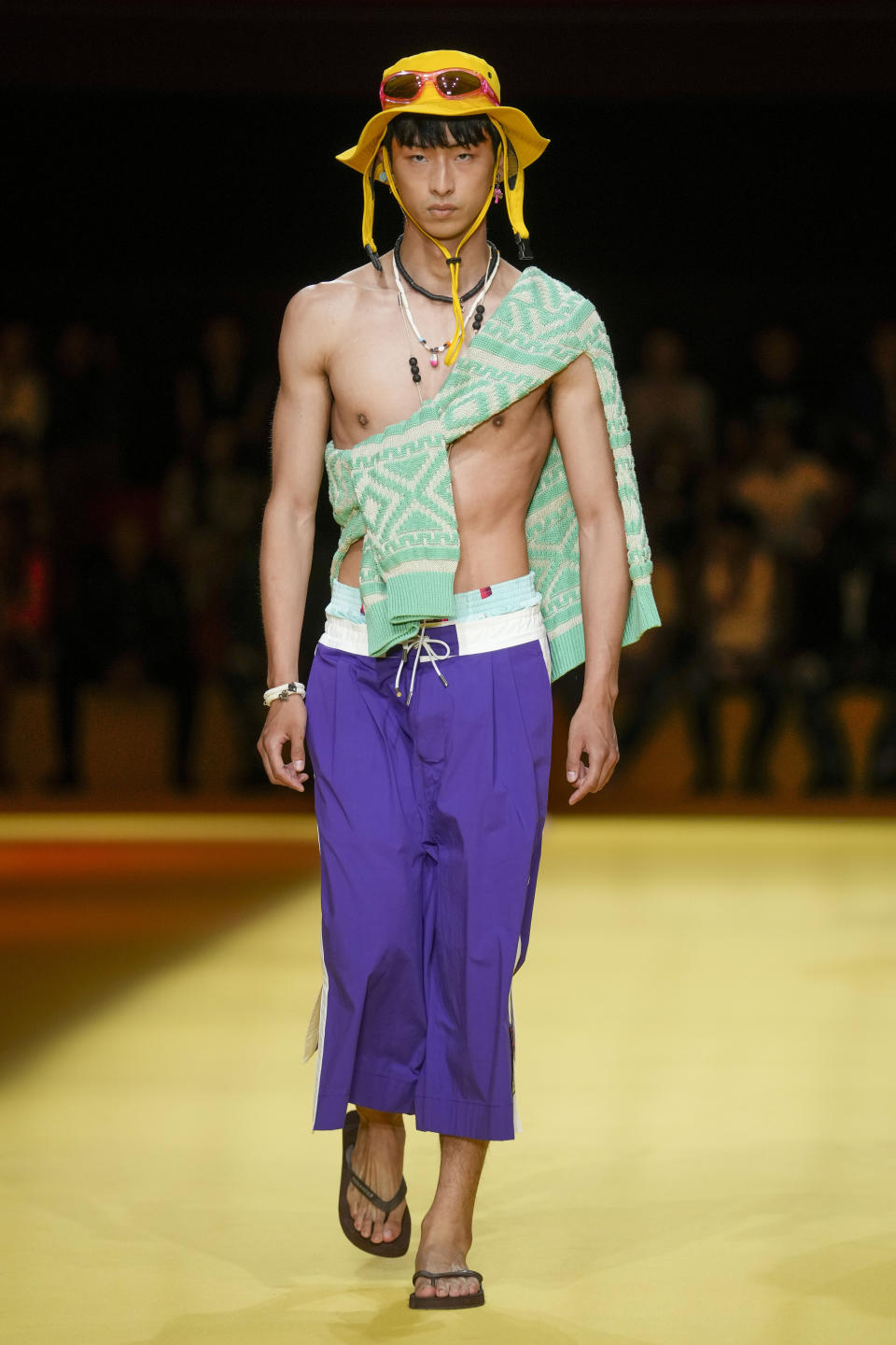 A model wears a creation as part of the Dsquared2 men's Spring Summer 2023 collection presented in Milan, Italy, Friday, June 17, 2022. (AP Photo/Luca Bruno)