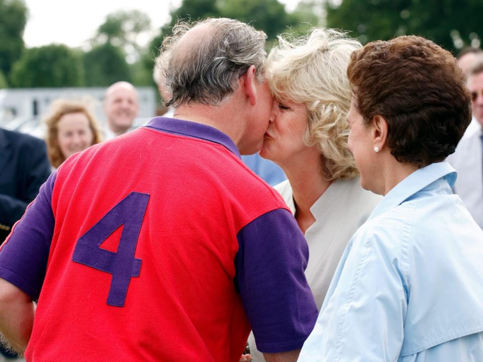 Camilla, Queen Consort kisses King Charles III.