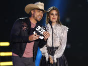 <p>Dustin Lynch and Rachel Bilson present the award for group video of the year at the CMT Music Awards at Music City Center on Wednesday, June 7, 2017, in Nashville, Tenn. (Photo by Wade Payne/Invision/AP) </p>