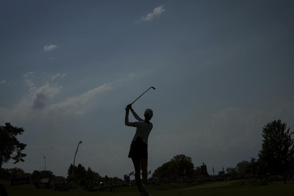 Nelly Korda, of USA, follows her ball after playing on the 16th hole during the Evian Championship women's golf tournament in Evian, eastern France, Saturday, July 23, 2022. (AP Photo/Laurent Cipriani)