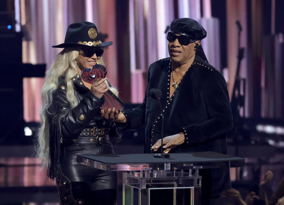 Beyoncé accepts the Innovator Award from Stevie Wonder onstage during the 2024 iHeartRadio Music Awards at Dolby Theatre in Los Angeles, California on April 01, 2024.