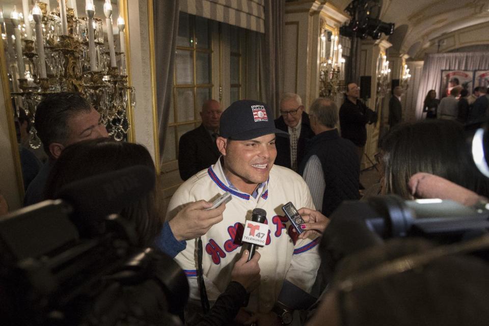 Newly elected baseball Hall of Fame inductee Ivan Rodriguez speaks to reporters during a news conference, Thursday, Jan. 19, 2017, in New York. (AP Photo/Mary Altaffer)