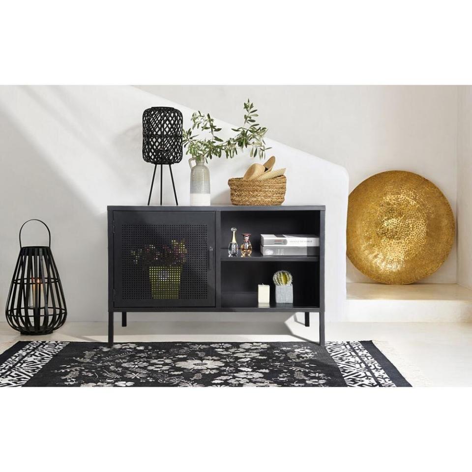 This might be called a "bar cabinet," but you can use it as a TV stand since it has extra drawer space for remote controls, books and board games. <a href="https://fave.co/3jGGjee" target="_blank" rel="noopener noreferrer">﻿Originally $130, get it now for $95 at The Home Depot</a>.