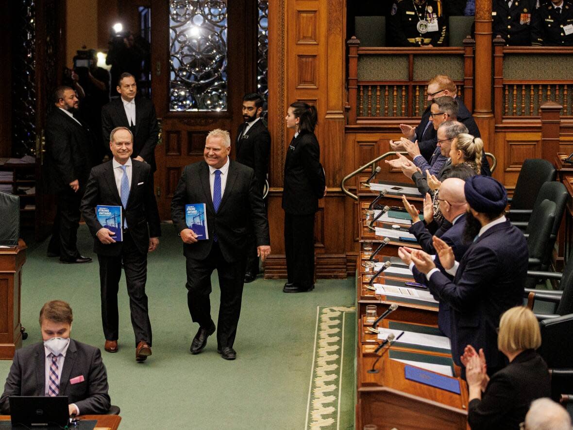 Finance Minister Peter Bethlenfalvy, left, will deliver the 2024 Ontario budget on Tuesday. It will be Bethlenfalvy's fourth budget since Premier Doug Ford appointed him to the post. (Evan Mitsui/CBC - image credit)