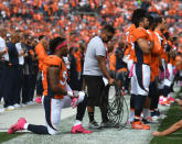 Denver Broncos' Brandon Marshall kneels during the national anthem before a game against the Atlanta Falcons on Sunday, Oct. 9, 2016 at Sports Authority Field at Mile High in Denver, Colo. (Mark Reis/Colorado Springs Gazette/TNS)