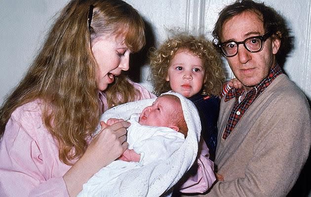 Dylan Farrow, seen here being held by her father Woody Allen as her mother Mia Farrow cradles her newborn son Satchel. Source: Getty