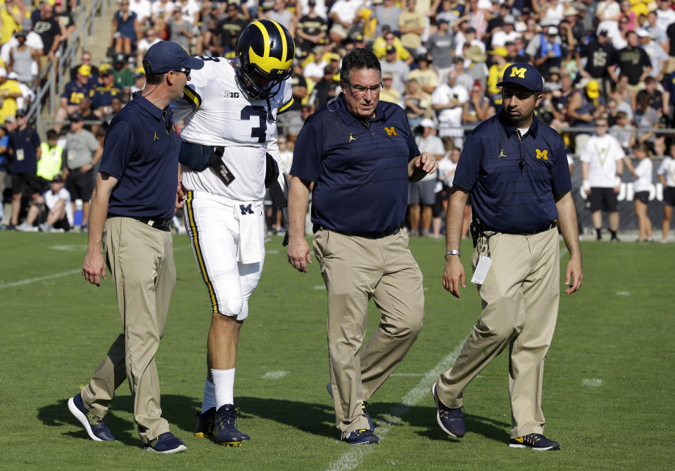 Michigan quarterback Wilton Speight went down with an undisclosed injury during Michigan’s win over Purdue on Sept. 23. (AP Photo/Michael Conroy)