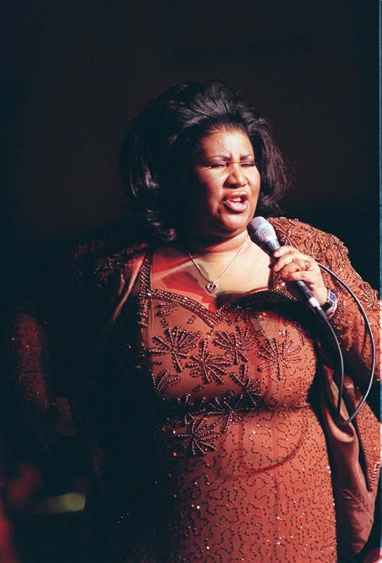 Aretha Franklin sings with the Detroit Symphony Orchestra on Nov. 27, 1998, at Orchestra Hall in Detroit.