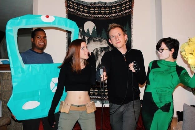A group of friends dressed as Wade, Kim, Ron, and Shego from "Kim Possible"