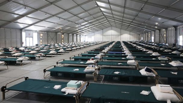 PHOTO: Beds are seen in the dormitory at the Randall's Island Humanitarian Emergency Response and Relief Center, Oct. 18, 2022, in New York City. (Michael M. Santiago/Getty Images)