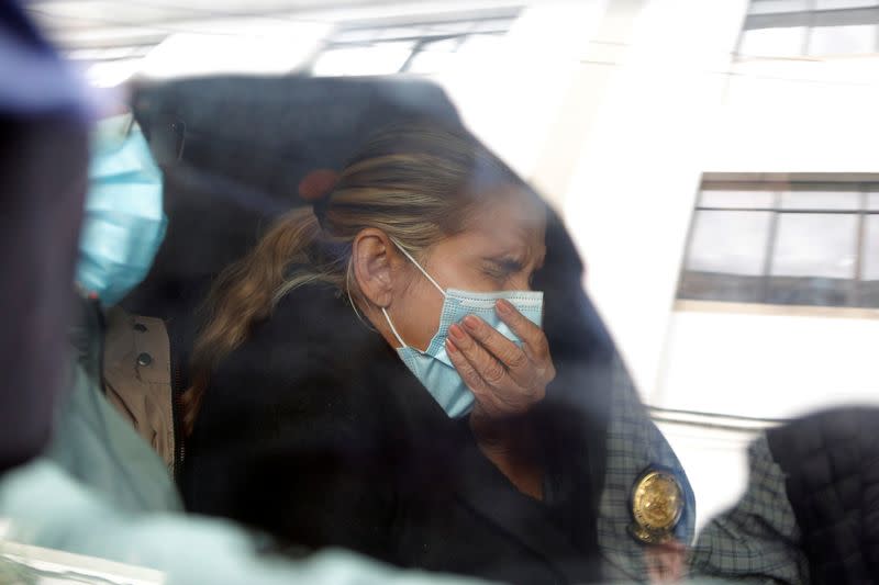 Bolivia's former interim President Jeanine Anez is seen in a car outside the FELCC (Special Force to fight against Crime) headquarters in La Paz