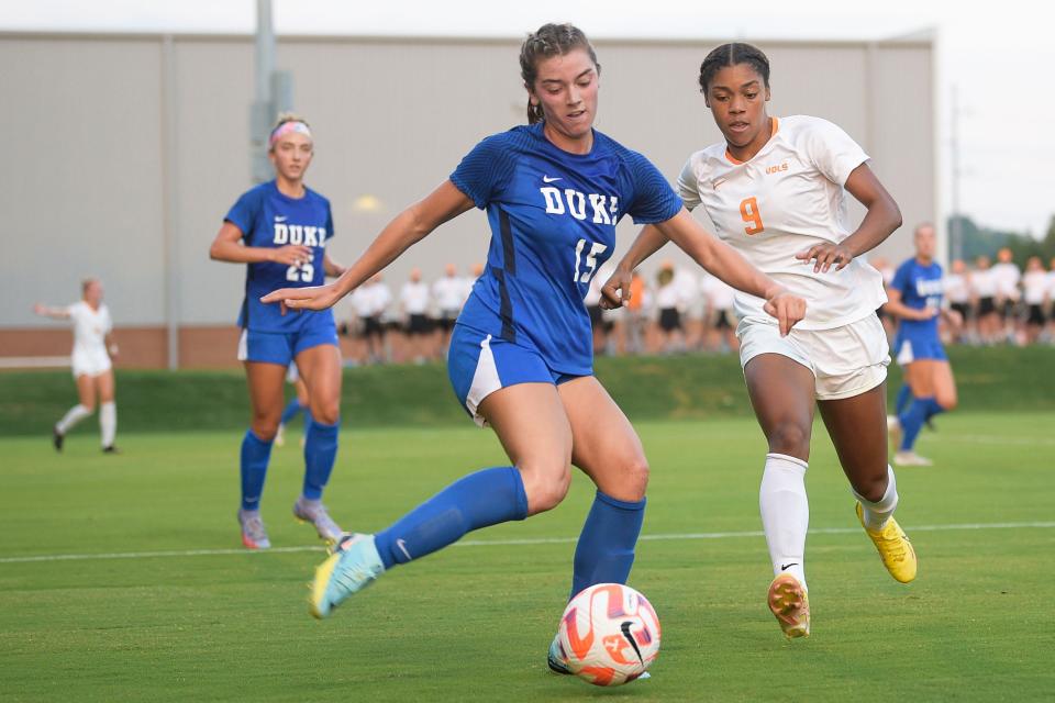 Duke defender Emily Royson (15) and Tennessee forward Kameron Simmonds (9) go for the ball during a game between Duke and Tennessee at Regal Soccer Stadium in Knoxville, Tenn. on Thursday, Aug. 25, 2022.