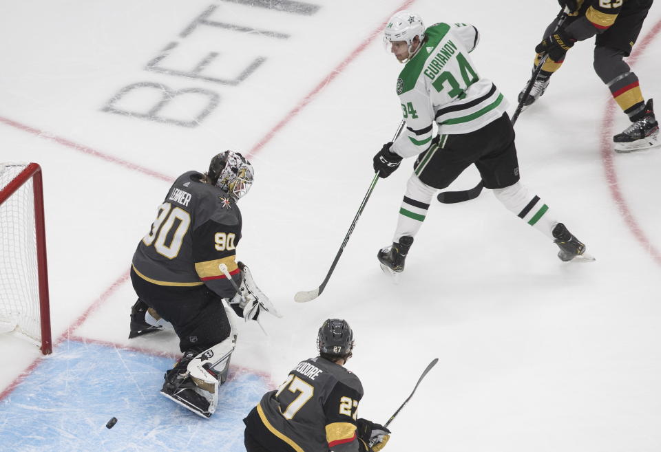 Dallas Stars' Denis Gurianov (34) is stopped by Vegas Golden Knights goalie Robin Lehner (90) during the third period of Game 2 of the NHL hockey Western Conference final, Tuesday, Sept. 8, 2020, in Edmonton, Alberta. (Jason Franson/The Canadian Press via AP)