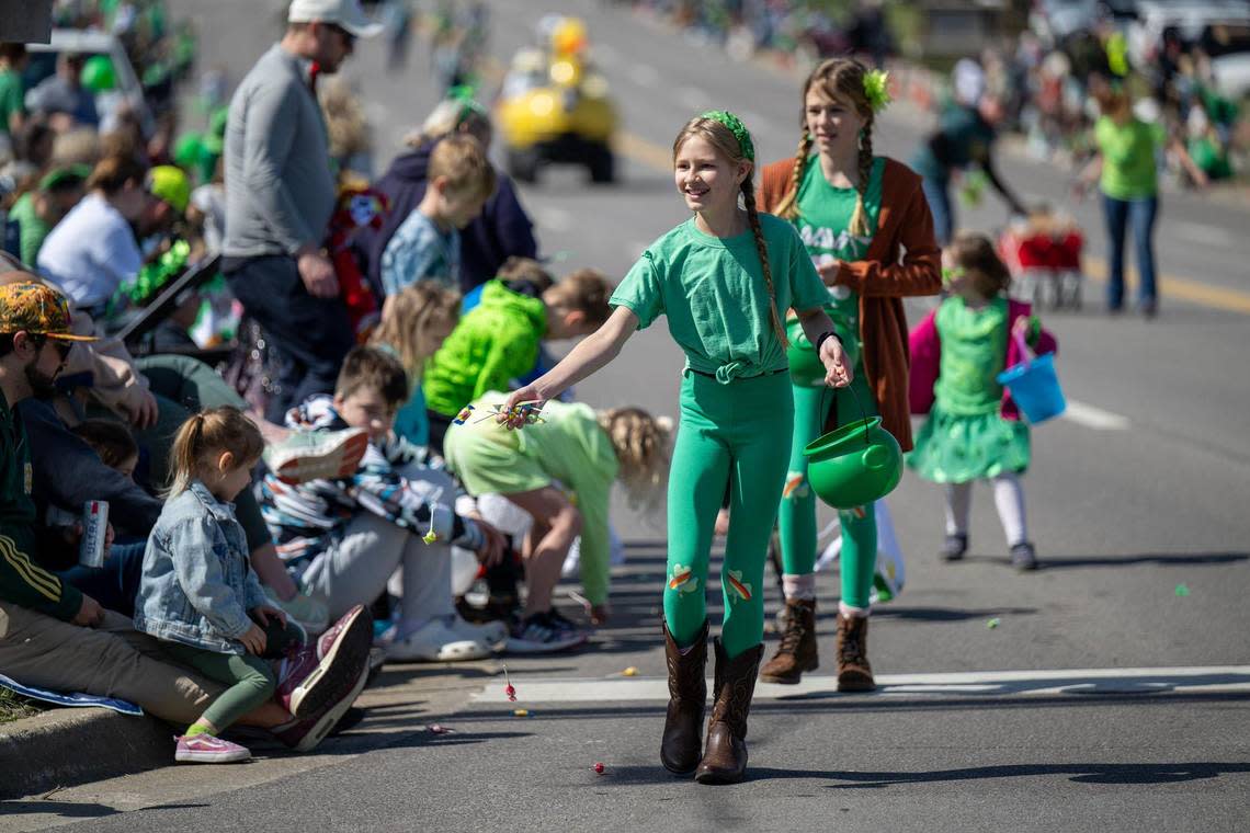Parade participants tossed candy to the crowds along Johnson Drive on hand to watch the 38th annual Shawnee St. Patrick’s Day Parade on Sunday, March 10, 2024.