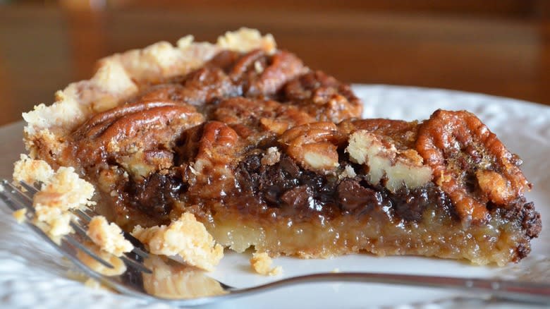 sliced chocolate pecan pie 