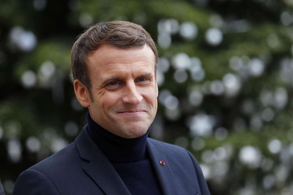 French President Emmanuel Macron listens to European Council President Charles Michel prior to their meeting at the Elysee Palace, in Paris, Tuesday, Dec. 10, 2019. The two men discussed Europe's plans for Brexit, European efforts against climate change and this week's European Union summit in Brussels. (AP Photo/Francois Mori)