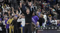 Utah Jazz coach Will Hardy reacts after Jazz forward Simone Fontecchio's dunk late in the second half of an NBA basketball game against the Golden State Warriors on Wednesday, Dec. 7, 2022, in Salt Lake City. (AP Photo/Rick Bowmer)