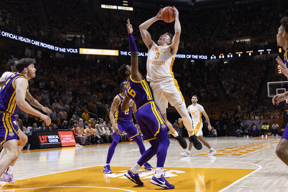 Tennessee guard Dalton Knecht (3) shoots over LSU guard Jordan Wright (6) during the first half of an NCAA college basketball game Wednesday, Feb. 7, 2024, in Knoxville, Tenn. (AP Photo/Wade Payne)