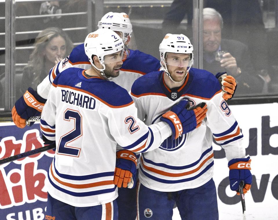 Edmonton Oilers' Connor McDavid, right, gathers with teammates after scoring against the Los Angeles Kings during the first period in Game 6 of an NHL hockey Stanley Cup first-round playoff series in Los Angeles on Saturday, April 29, 2023. (Keith Birmingham/The Orange County Register via AP)
