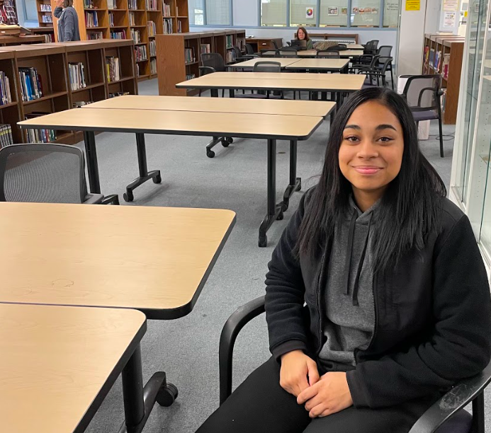 Ajah Johnson in the library her project helped upgrade. (Asher Lehrer-Small)