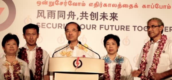 Foreign Affairs Minister George Yeo congratulates the Workers' Party on its historic win. (Yahoo! photo/Alicia Wong)
