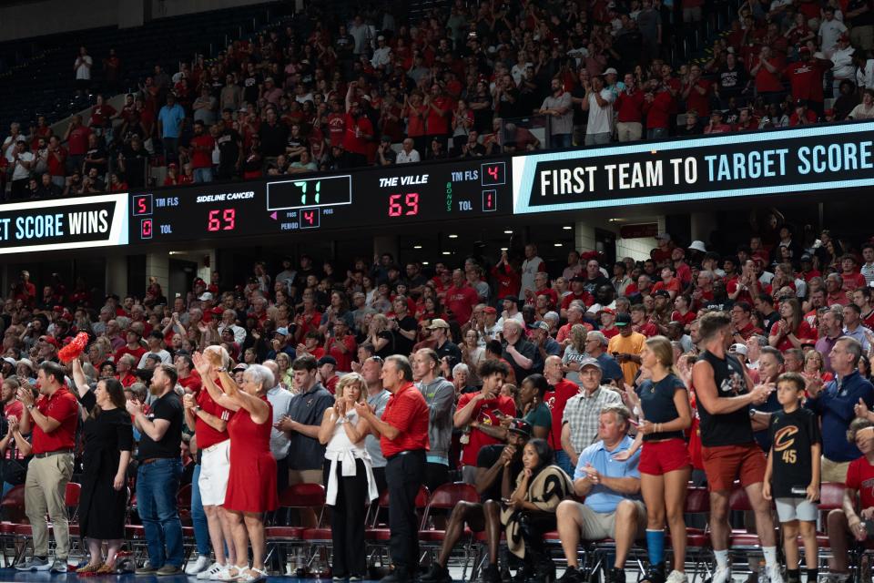 The Ville's fans cheer on the team during the final moments against Sideline Cancer on Monday night at Freedom Hall.