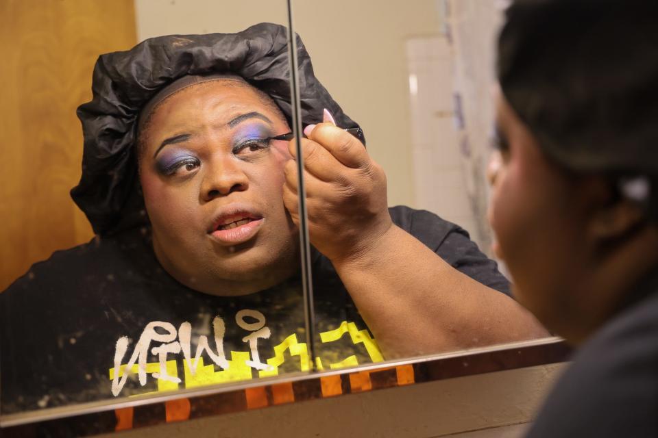 Diana Rae Ellis, 30, who goes by the drag show name Diana Rae, prepares to perform at a recent Drag Queen Story Time event in Louisville, Ky